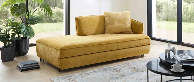 Das OLDENBURG DELUXE Schlafsofa ist in vielen Stoffen erhältlich und kann auch als elegante Recamiere eingesetzt werden