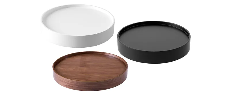 Die Tabletts für den DRUM Hocker von Softline machen aus dem Hocker im Nu einen Beistelltisch